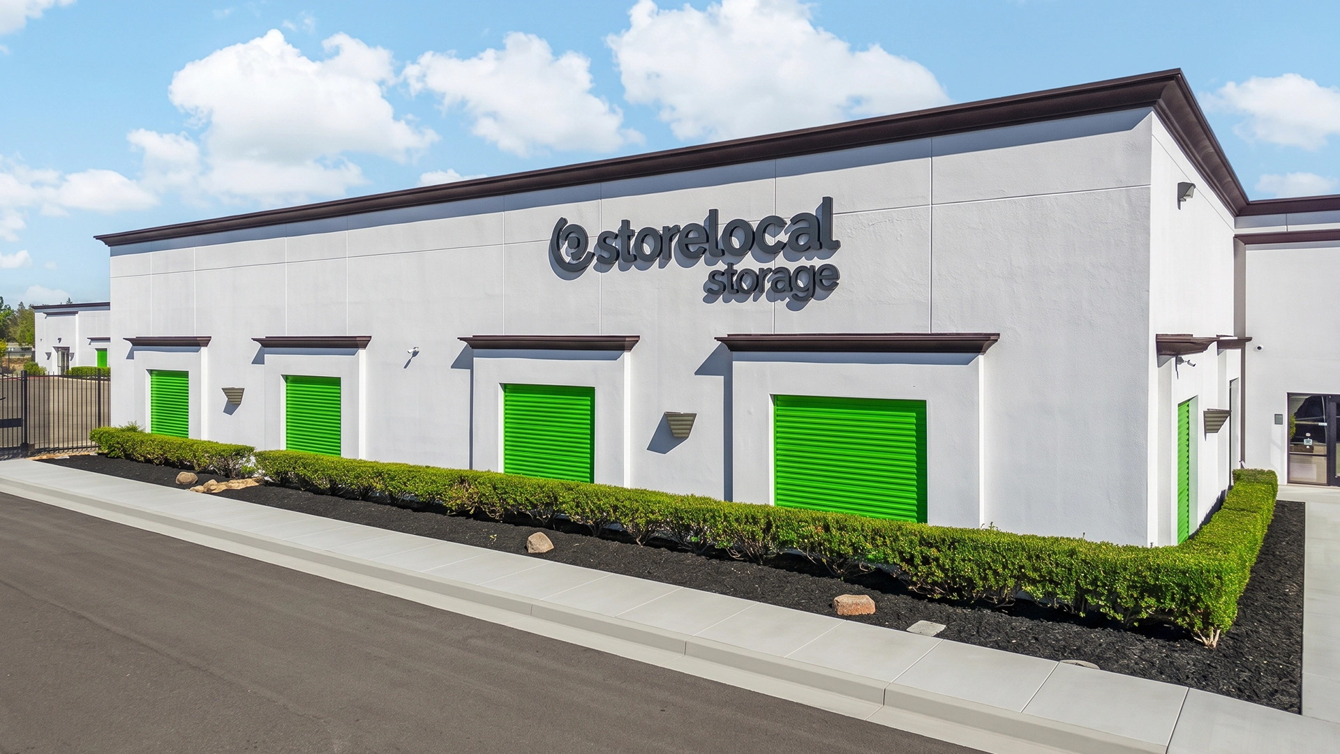 Self-storage corridor with roll-up doors